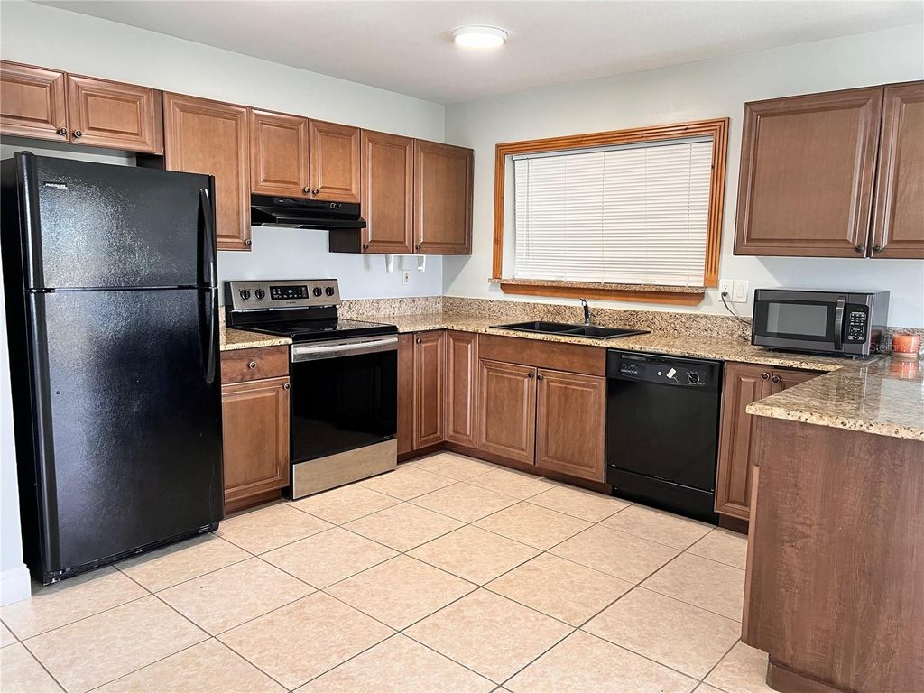 Photo of 1299 Birchcrest Boulevard, Port Charlotte, FL 33952 (MLS # TB8499184)