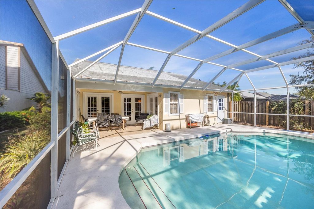 Photo of 7716 Geneva Lane, Sarasota, FL 34243 (MLS # A4655951)