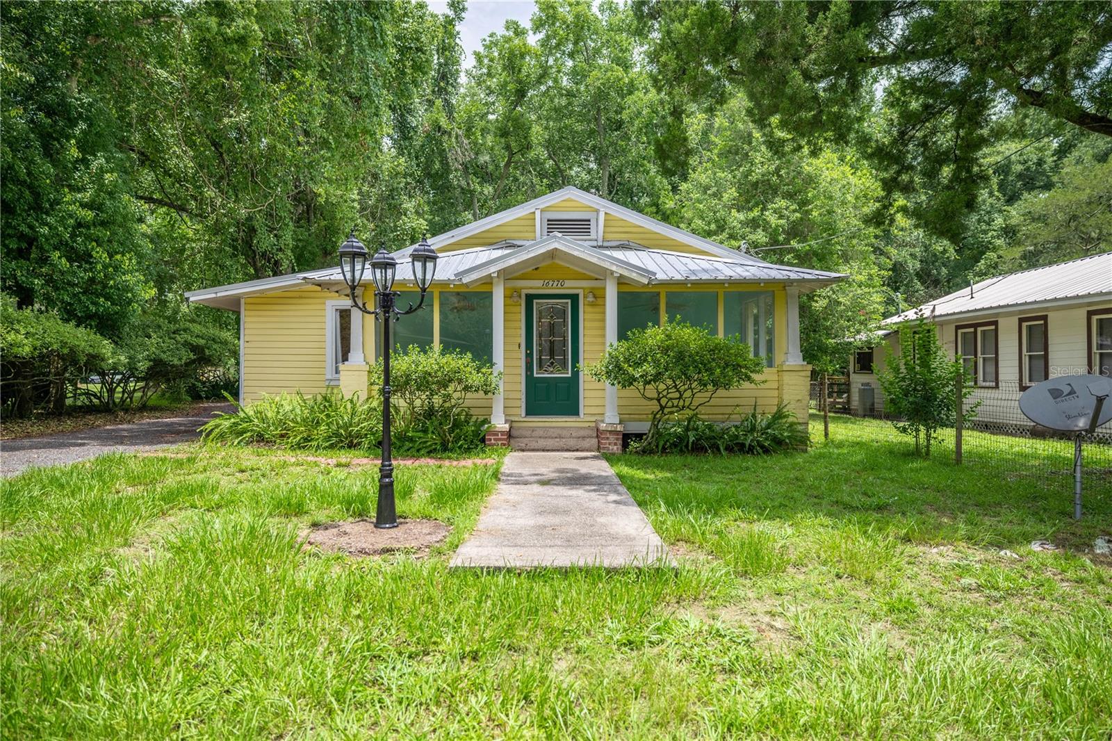 Step into a piece of history with this charming 1927 3-bedroom, 2-bath home in the heart of Archer. Thoughtfully updated while preserving its original character, this 1,260 sq ft home blends vintage appeal with modern comfort. Set on a 0.25-acre lot, it offers spacious living areas, a bright kitchen, and timeless architectural details throughout. Enjoy the peaceful small-town atmosphere of Archer, known for its friendly community, scenic countryside, and easy access to outdoor recreation like nearby lakes and nature trails. Conveniently located just a short drive from Gainesville, you’ll have quick access to shopping, dining, entertainment, and the University of Florida. This is a unique opportunity to own a well-maintained historic home with enduring charm in a location that perfectly balances quiet living and city convenience.