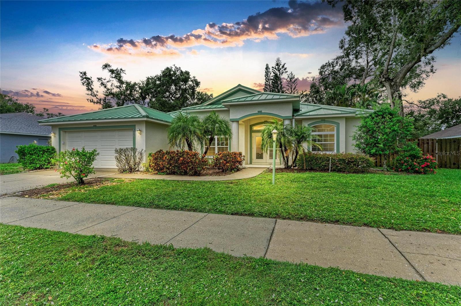 Under contract-accepting backup offers. Welcome to this beautifully maintained home in an exclusive gated community of only 34 residences—ideally located just minutes from downtown Sarasota, beaches, shopping, schools, airport, and I-75. This property features a durable metal roof, newer solar panels with battery backup, and hurricane impact sliders and select windows for energy efficiency and peace of mind. Inside, you’ll find tile flooring throughout, a large kitchen with 42” cabinets and granite countertops, and a newer refrigerator. The spacious floor plan offers open views from every room and easy access to the spectacular heated pool with waterfall, all enclosed within a screened lanai perfect for entertaining. Don’t miss the opportunity to own this tropical retreat in a prime Sarasota location.