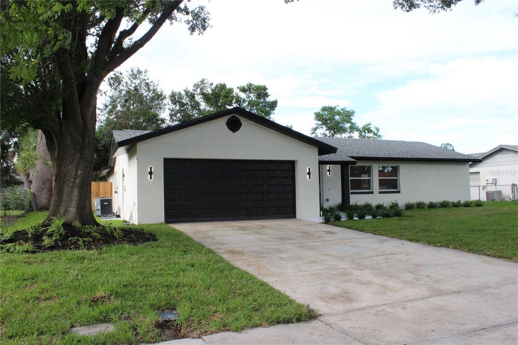 Photo of 7015 Crestlake Drive, Orlando, FL 32819 (MLS # O6428433)