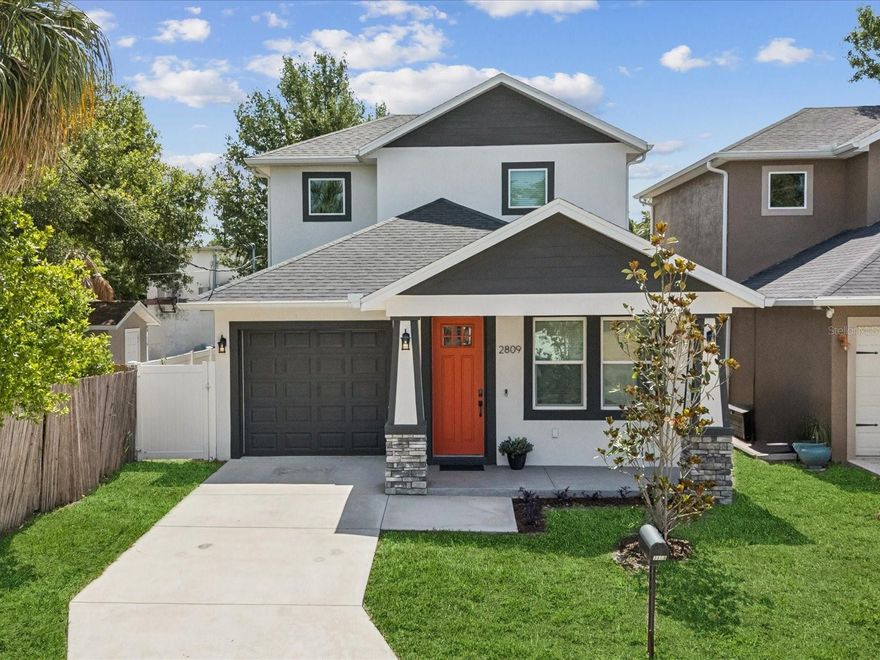 Now is your chance to own in one of Tampa’s fastest-developing areas, just minutes from downtown. Welcome to 2809 N 21st Street, a beautifully designed 3 bedroom, 3 bathroom home offering 1,676 square feet of functional living space just north of historic Ybor. This modern residence blends comfort and style, featuring soaring 9'4" ceilings, recessed lighting, and durable luxury vinyl plank flooring throughout. The thoughtfully designed layout includes a full bedroom and bathroom on the main level, perfect for guests or multigenerational living. Upstairs, you’ll find a spacious secondary suite along with an impressive primary retreat complete with a large walk-in closet. Both upper-level bedrooms showcase elegant tray ceilings. The heart of the home is a designer-inspired kitchen complete with wood cabinetry, sleek quartz countertops, and stainless steel appliances, creating the ideal space for both everyday living and entertaining. Step outside to enjoy a fully fenced backyard with a covered patio, offering a private setting to relax or host gatherings. Built for peace of mind and efficiency, the home includes hurricane-impact windows and a dual-zone AC system to ensure personalized comfort on each floor.  Located minutes from Downtown Tampa, you can explore Ybor’s vibrant dining, hop on the trolley to the Channel District, Water Street, or catch a concert or game at Benchmark International Arena, home of the Tampa Bay Lightning. With transformative projects like the 50-acre Gas Worx connecting Ybor to Downtown, this property is ideally positioned for continued growth and investment potential. Even better, there is no HOA, no CDD, and short-term rentals are permitted, offering incredible flexibility for homeowners and investors alike. The home can also be sold furnished, making it truly move-in or rental ready. Don’t miss this exceptional opportunity to own in one of Tampa’s most exciting and evolving areas.