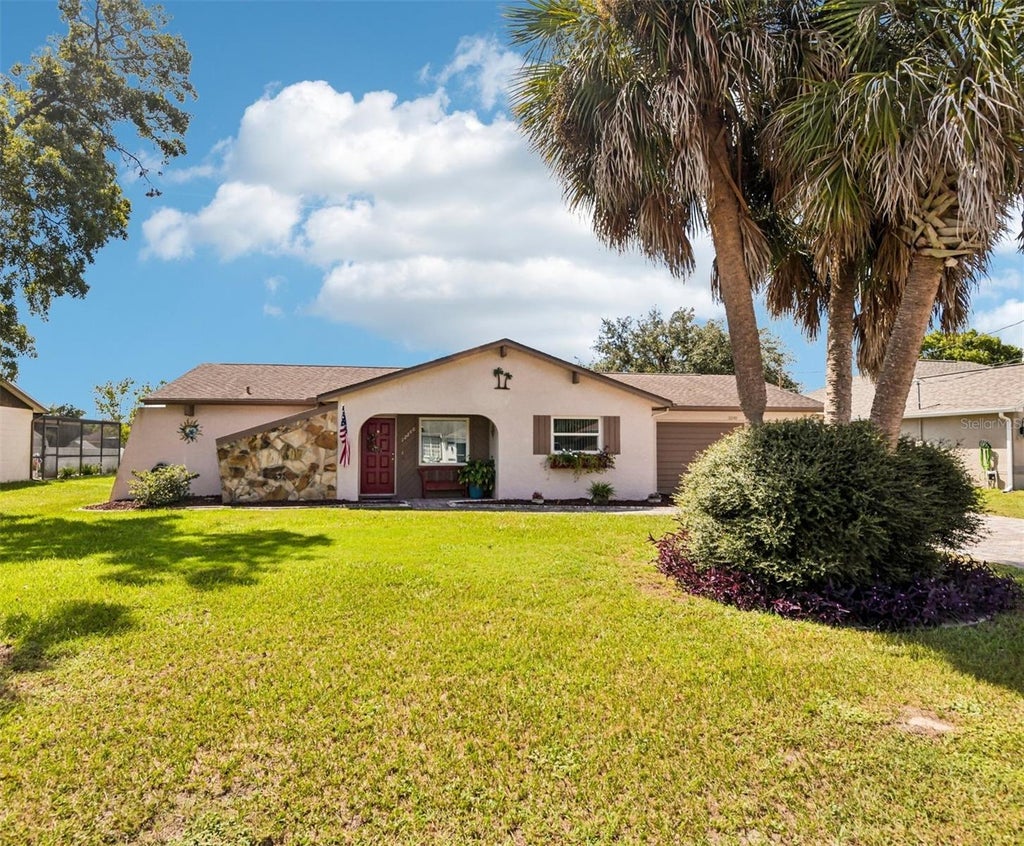 Photo of 12240 Katherwood St, Spring Hill, FL 34608 (MLS # TB8553330)