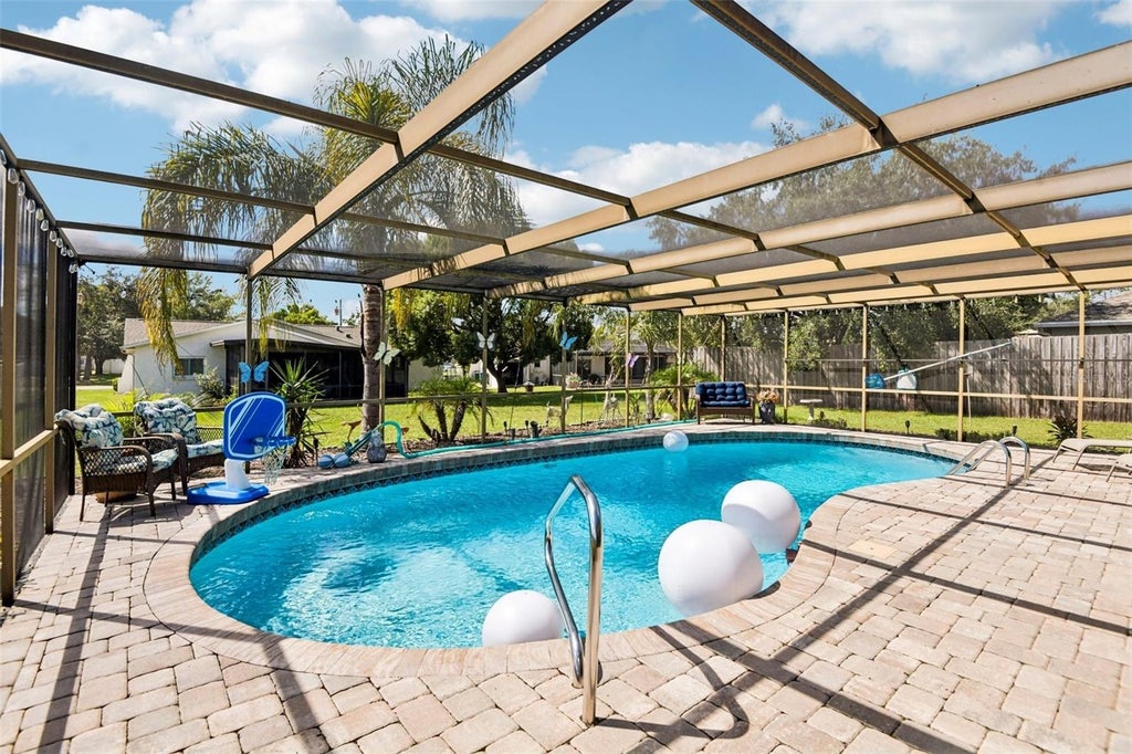 Photo of 12240 Katherwood St, Spring Hill, FL 34608 (MLS # TB8553330)