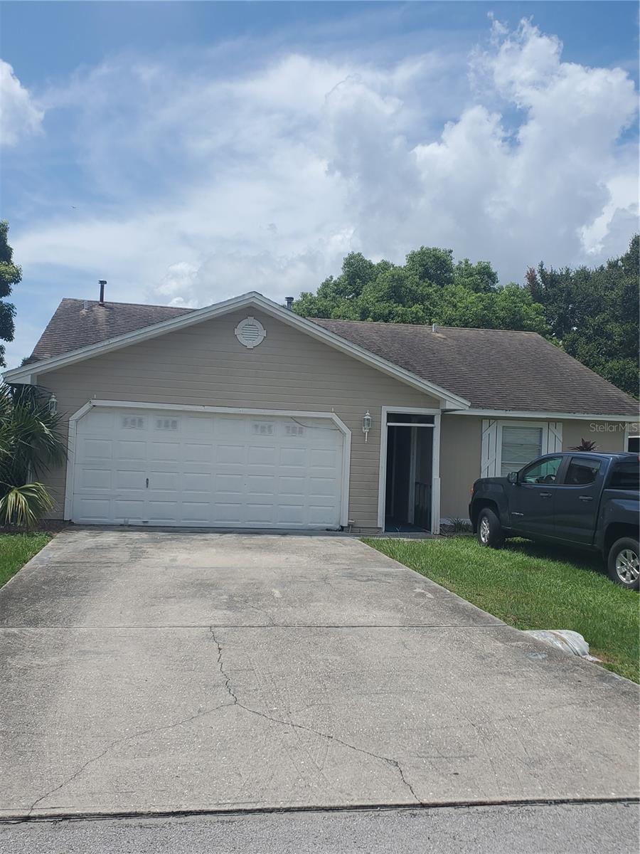Convenient location in Southeast Winter Haven. With some TLC, this 2BD/2BA has a ton of potential. This home has an open floor plan with vaulted ceilings, two car garage and is located close to shopping and schools.