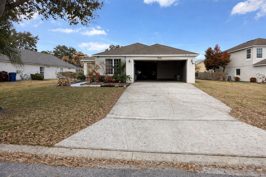 Photo of 1658 Dunes Court, Haines City, FL 33844 (MLS # A4683488)