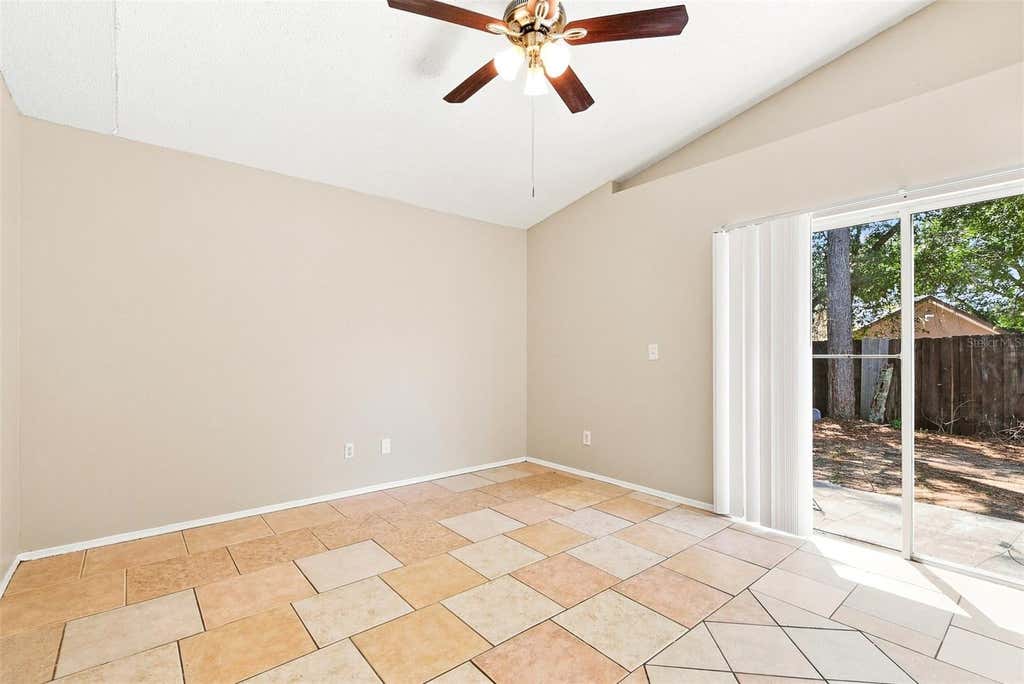 Photo of 4758 Muir Village, Orlando, FL 32808 (MLS # TB8540734)