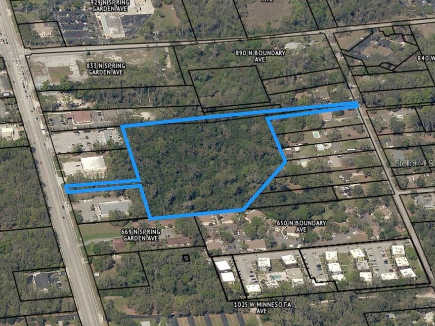 Multi Family Development Opportunity- Located close to of Brains Barbecue and minutes by car from Adventist Hospital, Doctors Offices, Winn Dixie Grocery Store and oh yes the Big Rig 2 Dinner. This 9+ acre parcel has access on N. Spring Garden Ave yet is tucked back off the road Approx 300 Ft. with a quite neighborhood atmosphere, the property also access Boundary Ave. The seller indicated the City of Deland approved a site plan in the past that allowed 116 units on the property. That makes this a great investment/opportunity as well as a great place for apartments or Condos don’t wait too long or someone else will be building on it.  Due Diligence Report is available