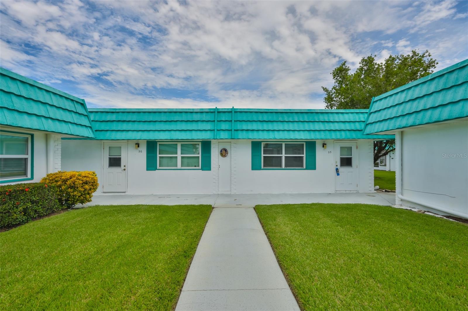Welcome to the popular 55+ community of Kings Point where you can live the ultimate Florida lifestyle. This warm and inviting 1 bedroom/1.5 bath home is move-in ready! The beautifully updated kitchen features modern cream-colored cabinets, granite counters, stainless steel appliances, and a beautiful backsplash. A large pantry cabinet with extra counter space was added to allow for maximum storage. Crown molding adorns the living room and dining area and no popcorn ceilings. All windows have been replaced (even the enclosed patio windows) and the concrete lanai has been extended allowing for golf cart parking. The lanai has a window unit AC. Washer and Dryer are newer (Feb 2024). An extra 4 x 5 ft storage space is included. The furniture and golf cart are available under a separate contract. Enjoy all the benefits of Kings Point, an active adult gated community where you will never be bored and your social life will be as active as you want it to be. You can travel by golfcart to over 200 clubs, 2 clubhouses with dining options, several indoor/outdoor heated pools, fitness facilities, pickleball courts, tennis, shuffleboard, and much more. Your fees include all the amenities plus water, trash, sewer, cable, internet, exterior maintenance including roof, grounds maintenance, and security guards at the gated entrance. You can enjoy a carefree lifestyle, make friends for life, and be conveniently located close to restaurants, beaches, shopping centers, doctors, hospitals, Tampa and Sarasota airports, Disney, and Sea World. For more information about the community, the amenities, and the KP Warranty, visit their website at www.kpscc.com. Don't miss the opportunity to call this exceptional place your new home!