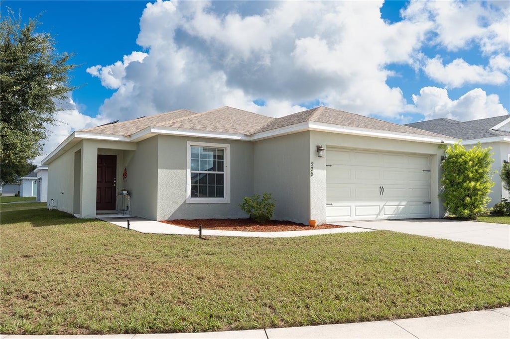 Photo of 225 Sandestin Drive, Haines City, FL 33844 (MLS # S5156389)