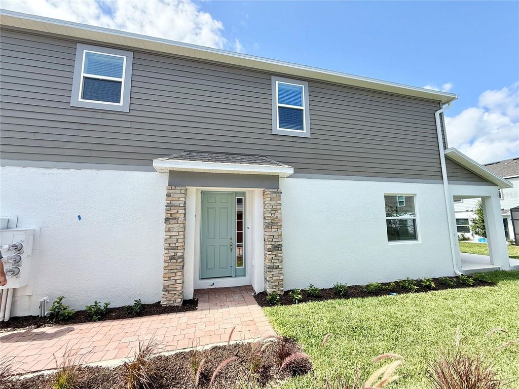 Photo of 4715 E Campsite Loop, Orlando, FL 32824 (MLS # O6410065)