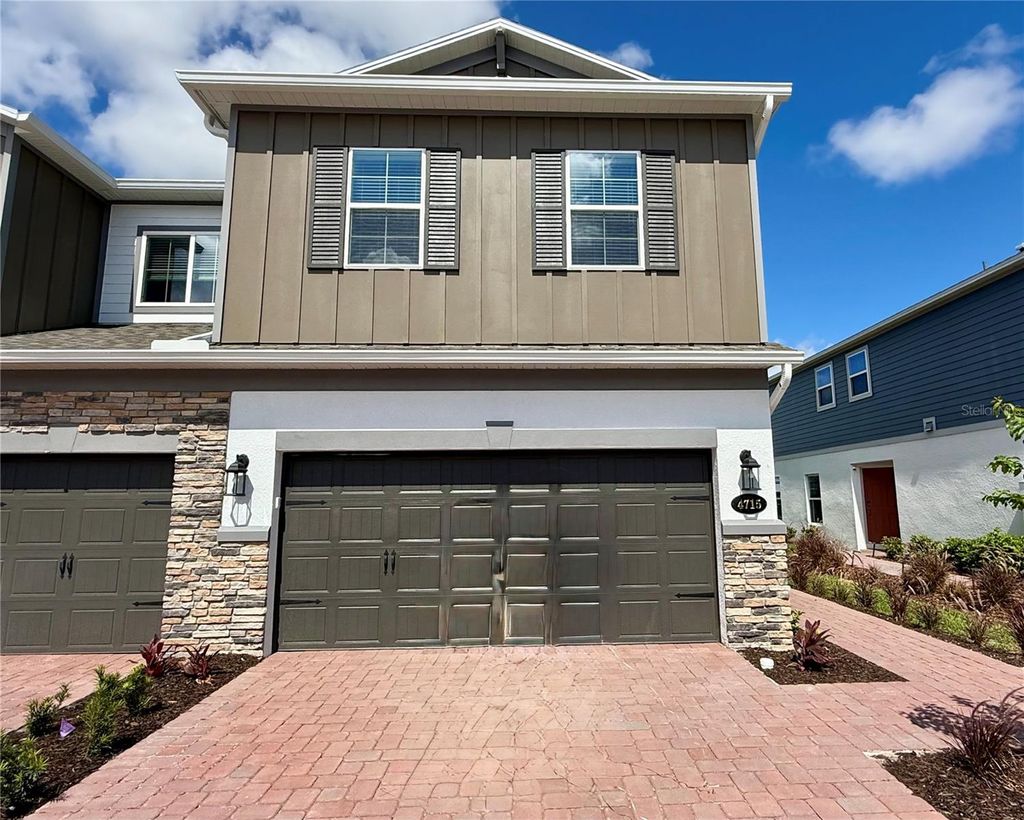 Photo of 4715 E Campsite Loop, Orlando, FL 32824 (MLS # O6410065)