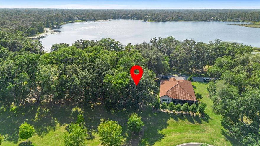 DELAND: The Lakes of DeLand community is known for its distinctive architecture, tile roofs, paver sidewalks and driveways, and its connection to nature. This .19 acre lot is across from Lake Mamie. You can build you dream home with all the upgrades you have always wanted. In the gated Community Residents enjoy access to three natural lakes, walking paths, and non-motorized boat access. While the setting feels private and serene, you are just minutes from everything. The home is located less than two miles from the new Super Walmart, with more than 60 restaurants within a five-mile radius. Conveniently situated between Orlando and Daytona Beach, this home offers quick access to golf, beaches, and world-renowned attractions throughout Central Florida.