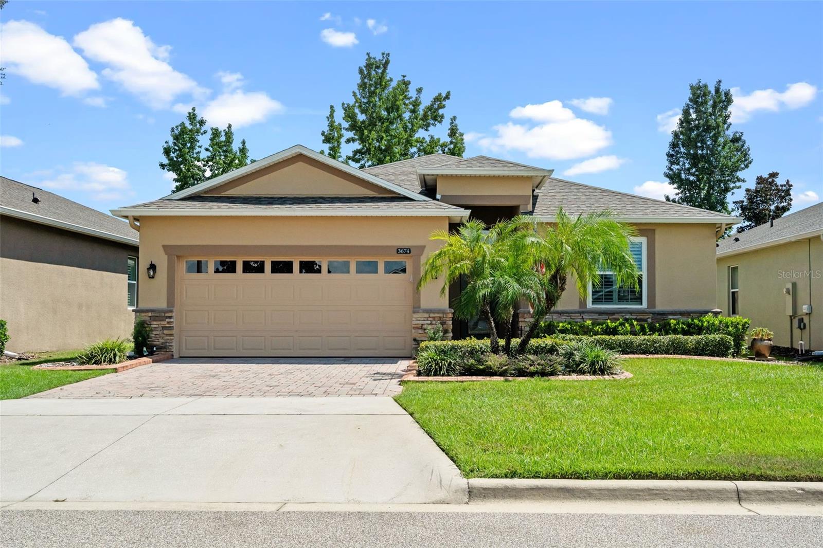 Popular Columbus model located in the sought after 55 plus community of Heritage Hills! This home includes 3 bedrooms and 2 baths with a 2 car garage and screened lanai. The kitchen is spacious with a breakfast nook by the front window, granite counter tops, loads of cabinet space and a breakfast bar. The flooring in the main living area is luxury vinyl with carpet in the bedrooms. All the windows have plantation shutters including the sliding glass door leading to the lanai. The primary bedroom is spacious and the bathroom includes a granite dual sink counter top, garden tub and shower. The front door is a beautiful beveled glass door. NEW ROOF in 2024, HVAC replaced in 2021. The family room includes a solar tube to let in more natural light! The screened lanai is a great place to enjoy the outdoors! The laundry room includes 2 cabinets and a hanging rack. The garage floor has modular interlocking flooring. You will enjoy this quiet neighborhood! Heritage Hills amenities include a heated pool and spa, pickle ball, tennis, basketball, bocce ball, shuffleboard, clubhouse with planned activities, lots of clubs to join, fitness center, art and crafts room, billiard room, card room and ballroom for holding events. Exterior is painted every 5-6 years and yard maintenance is included in the HOA fee! There is a 5 mile walking trail around the community. Call today for your private showing!