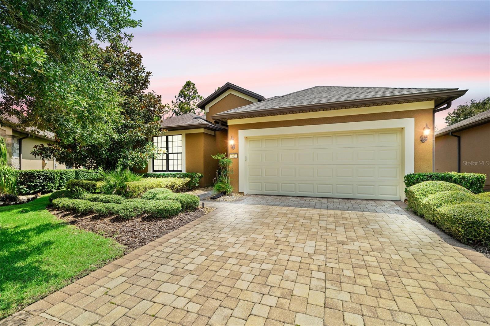 Welcome to the perfect blend of comfort, privacy, and community in this beautifully maintained home on a quiet cul-de-sac in the 55+ gated community of Riverwood by Del Webb, complete with 24/7 guarded security. This concrete block home features two bedrooms—including a guest suite with Murphy bed—and a separate office, all in a split floorplan that makes hosting family and friends easy. The spacious eat-in kitchen with center island flows into the dining area, family room, and screened lanai overlooking a peaceful preserve. Residents enjoy indoor and outdoor pools, pickleball, fitness center, billiards, a private gardening area, and access to all-ages Nocatee amenities—perfect when the grandkids visit. Make your move before someone else's retirement dream comes true!