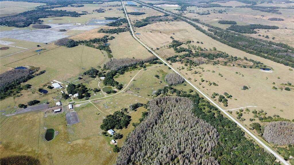 BEAR HAMMOCK RANCH
Welcome to Bear Hammock Ranch. Over 1,500 acres of land located just 30 miles from Walt Disney World, 27 miles South of Orlando International Airport and within 11 miles of shopping and other amenities located in the Kissimmee / St. Cloud area. This property is well located for rural-residential development with AC “Agricultural / Conservation” zoning designation by Osceola County that allows for 1 residential unit per 5 acres or 300 vested residential units.
This ranch is over 90% developable uplands with improved Bahia and Hemarthria grass pastures and sprawling oak and other hardwood hammocks. Multiple man-made lakes create unique enclaves that truly enhance this special property. Furthermore, this ranch has a two-lane undivided county road (Canoe Creek Road) that runs through the eastern portion dividing the ranch into two unique parcels consisting of 1200 +/- acres on the western side and 300 +/- acres on the eastern side that directly fronts the Florida Turnpike. The newly proposed Southport Corridor connector road is located just a few miles to the north as this ranch truly lies in the path of future growth.
Property is improved with two mobile homes, and one historic single-famly residence along with large equipment barns and cattle pens. This ranch has been in family ownership for over a century and is truly a unique and special offering.
We are proud to offer this incredible property for the asking price of $18,000,000.00 or just $12,000.00 per gross acre. Call listing agent for your private showing.
All prospects must be financially qualified by the broker prior to arranging any showings. No livestock or rolling stock included in the sale of the ranch and no seller financing is available. Cash or third-party financing is required.