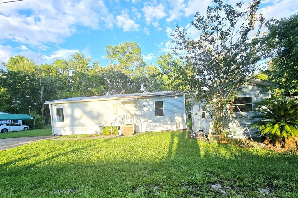 Photo of 208 Pine Tree Trail, Crescent City, FL 32112 (MLS # V4951496)