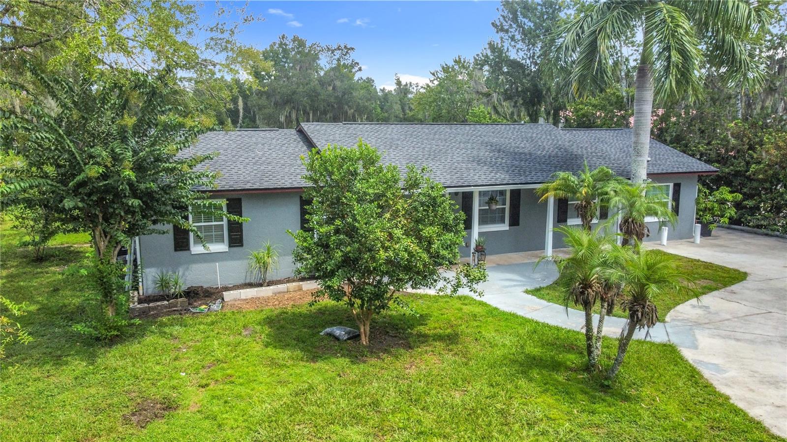 Welcome to a hidden gem nestled in the peaceful Seaward Plantation Estates! This beautifully maintained and updated 3-bedroom, 2-bathroom home offers an exceptional blend of comfort, privacy, and incredible outdoor space, all situated on a sprawling 1.06-acre lot. The property is zoned A-2 Farmland Rural, offering unique opportunities for agricultural pursuits right in your backyard.
Step into your private, fully-fenced oasis and discover a bounty of mature fruit trees, including banana, mango, and avocado. The expansive yard also features two storage sheds and a chicken coop, all of which convey with the home—perfect for hobby farming or extra storage. A circular driveway ensures ample parking, and three separate entrances (including two convenient side entrances) make access easy and versatile.
Inside, the 1,352-square-foot home boasts bright, open living spaces with tasteful updates. The kitchen is equipped with a sleek ceramic cooktop stove, ideal for home chefs. Major updates have been taken care of for you, including a 3-year-old roof, a 2017 water heater, and a 2016 A/C unit, ensuring years of worry-free living. The attached finished garage adds even more convenience and functionality.
This property offers the perfect balance of serene, country-style living with quick access to modern conveniences. You are just a short drive from major highways, including the 417 and 408, making commutes to Downtown Orlando, Orlando International Airport (MCO), and the region's world-famous attractions a breeze. For shopping and dining, the popular Waterford Lakes Town Center is nearby, offering a wide variety of retail stores and restaurants. The home is also zoned for highly rated schools, including Timber Springs Middle School (A-rated) and East River High School (B-rated), with AdventHealth East Orlando just minutes away for healthcare needs.
With its rare combination of land, thoughtful updates, and prime location, this exceptional property is a true find. Don’t miss your chance to own a private paradise in the heart of Orlando!