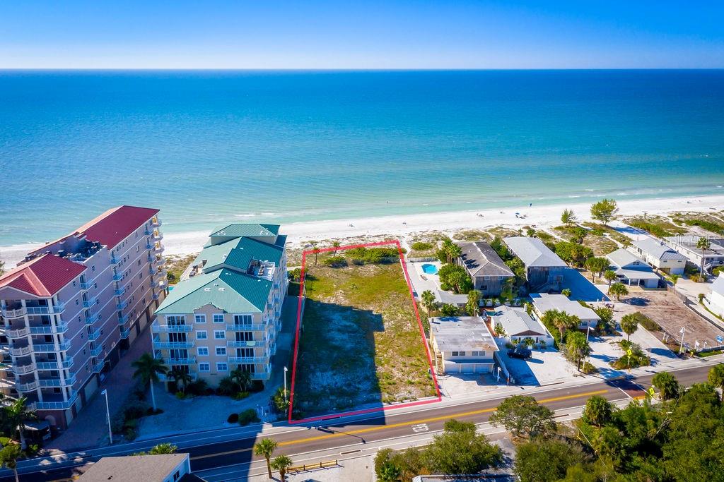 The Rarest of Commodities: A Vacant Direct Gulf Front Parcel Within The West Coast of Florida Beach Town of Indian Shores, As Quaint & Storied As They Come. Approximately 35 minutes to Tampa International Airport, and Almost The Same Distance to Downtown St. Petersburg. At A Little More Than 1/2 Of An Acre The Site Is Equally Suited For A Luxury Condo Development- It’s Currently Permitted To Build 8 Condos, Or For A Gulf and Beach Front Legacy Driven Single Family Home Compound w/ Guest Home, A Heritage Car Collection Garage, And All. The Possibilities Are Endless, Just As Your Imagination.