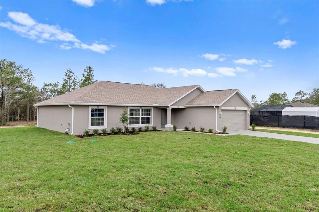 Photo of 12399 Piping Plover Avenue, Weeki Wachee, FL 34614 (MLS # W7882367)