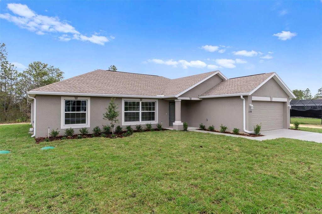 Photo of 12399 Piping Plover Avenue, Weeki Wachee, FL 34614 (MLS # W7882367)