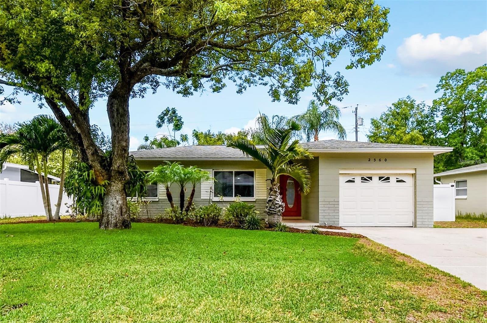 Adorable POOL Home with 5-hole putting green in the great neighborhood of Disston Heights. Beautifully maintained with tasteful finishes, updated kitchen and flooring, good-size bedrooms, tropical landscaping throughout complete with peacocks and an entertainer's back yard. This special cottage is fully hurricane/impact compliant w hurricane fabric for all openings. Transfer switch in place - Generator ready.