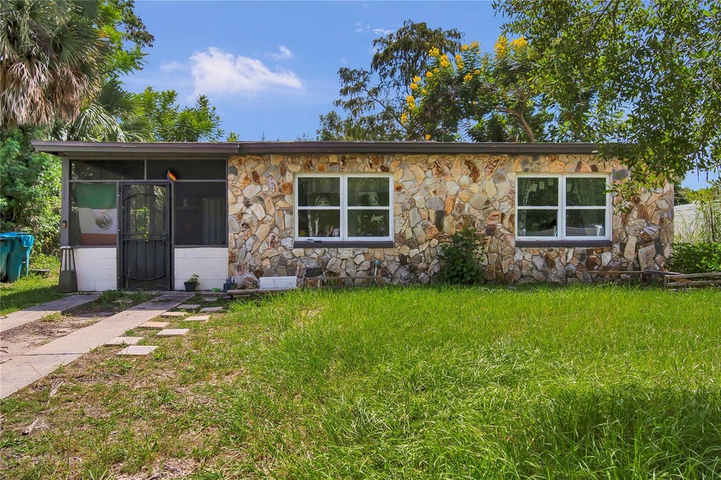 Photo of 4324 Aetna Dr, Orlando, FL 32808 (MLS # O6444356)