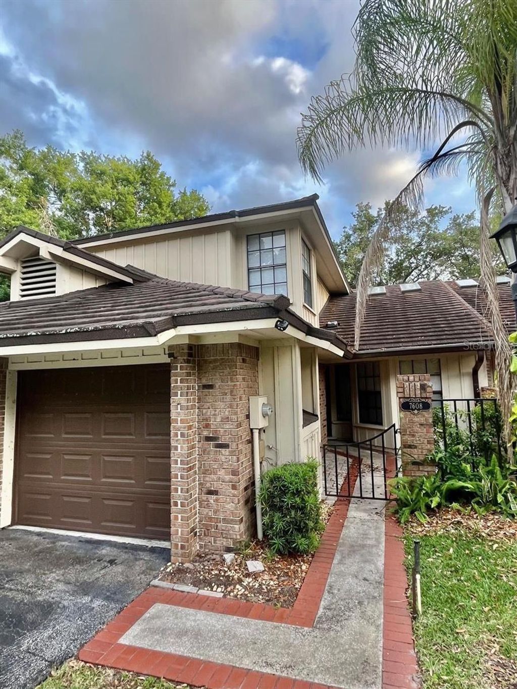 Photo of 7608 Spring Bay Cove #S, Orlando, FL 32819 (MLS # O6406816)
