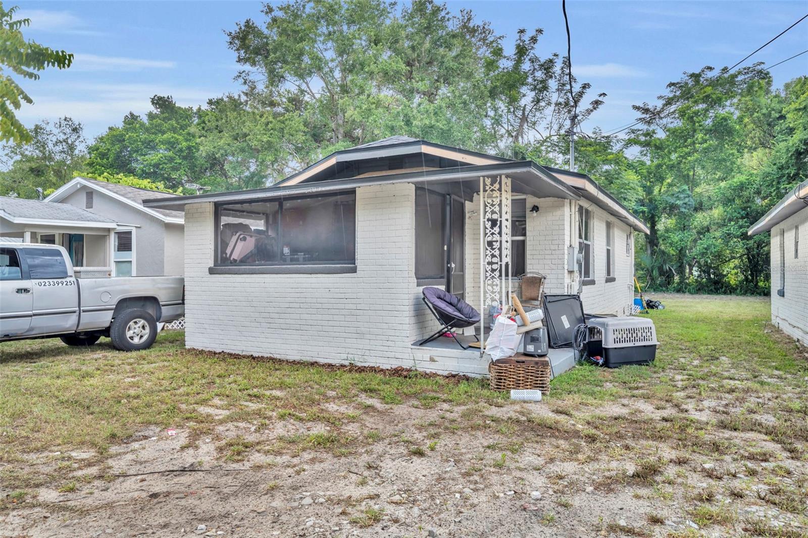 This charming two-bedroom and one-bath home is located on the left of this picture, it is located in Eustis just a short way from the downtown waterfront area!! The home is rented on a month to month basis with current tenant paying $1175 per month. Great ROI !! NEW ROOF! The home offers 665 square feet of renovated living space, blending modern comforts with classic appeal. With its close location to downtown, residents can enjoy easy access to local shops, restaurants, and community events. The home features a brand new permitted roof, updated electric panel, newer flooring, renovated bathroom and kitchen. Inside, you'll find a bright and inviting layout, with freshly painted walls and stylish flooring throughout. The open-concept living area seamlessly connects to the contemporary kitchen, which boasts updated appliances and ample counter space, perfect for cooking. Both bedrooms are comfortable, providing a cozy retreat for relaxation. The bathroom has been tastefully updated with modern fixtures and finishes, enhancing the overall aesthetic of the home. Outside, the property offers a manageable yard, ideal for enjoying Florida’s beautiful weather or for outdoor gatherings. This home is perfect for an investor wanting a turn key rental with over 10% ROI. Owner/Agent! PLEASE NOTE that owner has recently completed a Lot split. Only ONE home exists on this lot and is being offered for sale. Tax records do not reflect lot split at this time, but it has been approved by the City of Eustis and recorded with Lake County. Offer needs Legal Description on attached Survey. Home comes with a transferrable termite bond.