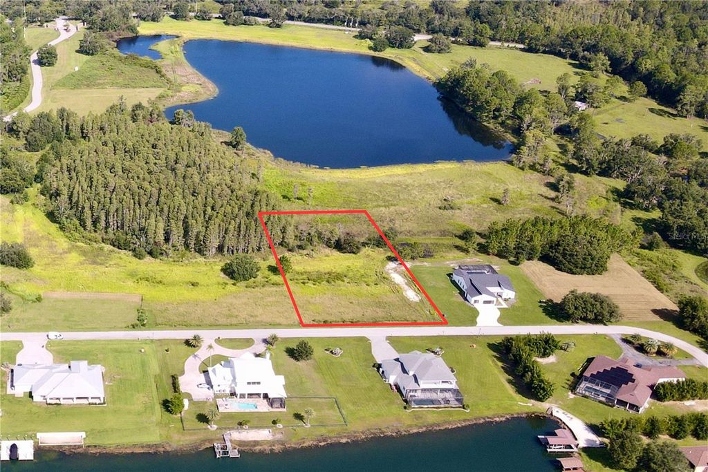 Photo of Hideout Trail, Land O Lakes, FL 34639 (MLS # TB8423915)