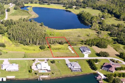 Photo of Hideout Trail, Land O Lakes, FL 34639 (MLS # TB8423915)