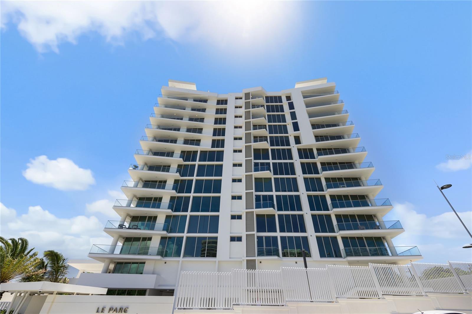 One or more photo(s) has been virtually staged. On the seventh floor of San Juan’s most coveted residential address, this 2,003 sqft corner apartment offers a quietly luxurious way of living. With two spacious bedrooms, two and a half bathrooms, and floor-to-ceiling windows framing open bay and city views, the layout is fluid, understated, and thoughtfully proportioned.
This residence has never been occupied. The kitchen comes fully equipped, the air is comfortably conditioned, and two deeded parking spaces are included, both ready for electric vehicles.
Though still a blank canvas, we’ve envisioned how the space comes to life when thoughtfully furnished. Here’s how it might look:
Le Parc’s amenities extend the experience far beyond the walls of your home. A cold plunge, massage room, steam and sauna suites, fitness center, meeting rooms, pickleball court, pool, dog park, and rooftop wine lockers are all curated for comfort, discretion, and everyday ease.
A short stroll connects you to the park, the beach, Club Náutico, and the cultural energy of Old San Juan and Condado.
For those seeking substance, style, and a place that feels quietly removed while fully connected—this is it.