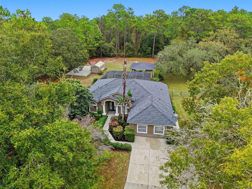 Photo of 10335 N Dauphine Terrace, Dunnellon, FL 34433 (MLS # TB8441230)