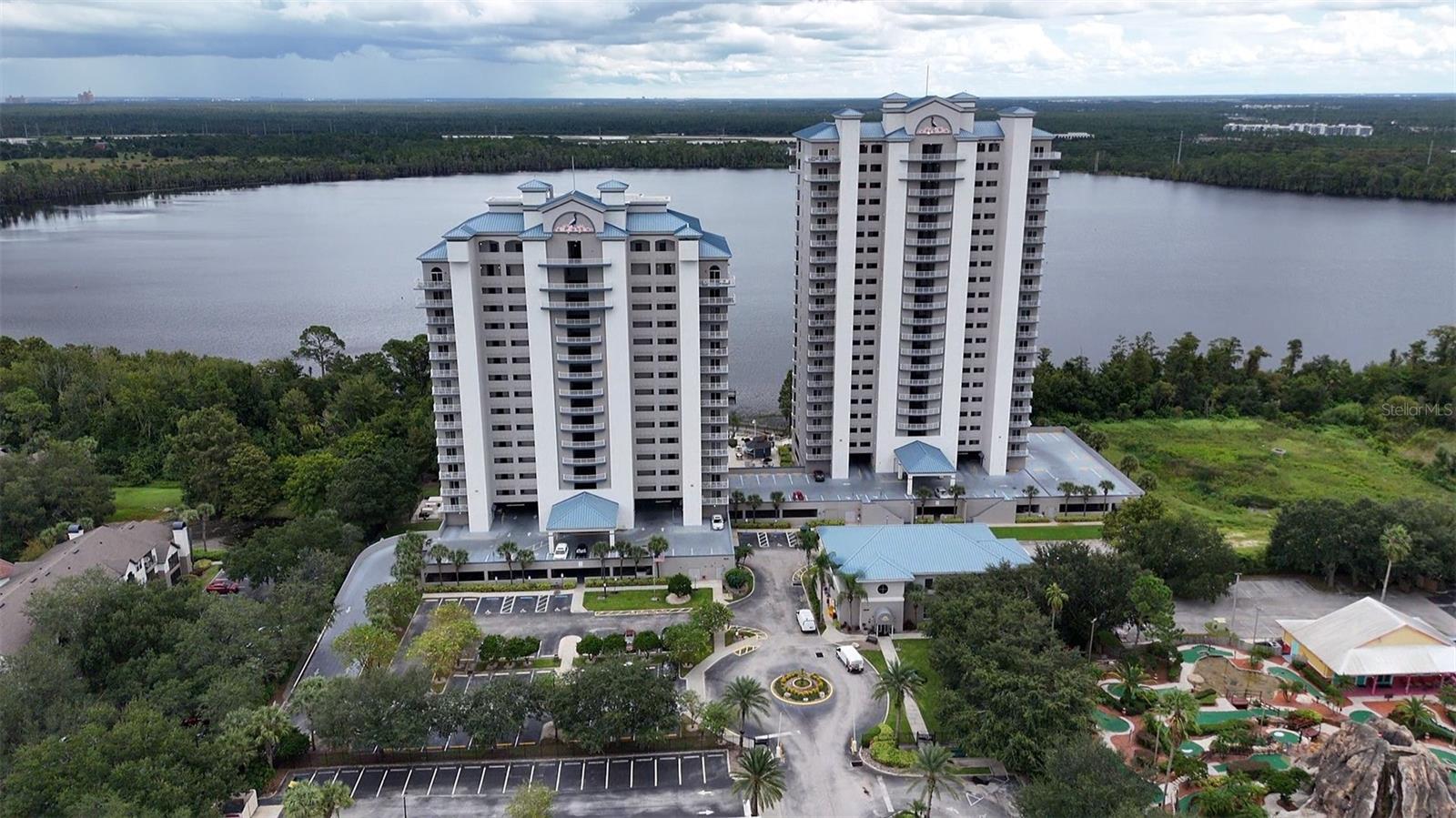 Discover the perfect blend of comfort, convenience, and investment potential with this fully furnished 4th-floor condo, offering stunning lake and pool views. Whether you're looking for a vacation getaway or an income-producing property, this unit is ready to rent and ideal for Airbnb. Enjoy the spacious layout, complete with a bunk bed and private balcony—perfect for taking in nightly Disney fireworks. Located just minutes from Disney, Orlando’s top attractions, world-class dining, entertainment, and the Orlando International Airport, this condo also places you only an hour away from Florida’s beautiful beaches. Resort-style living awaits with incredible amenities including two pools, one heated, a kiddie pool, a relaxing hot tub, two fitness centers, a scenic boardwalk, fishing pier, game room, and a poolside tiki bar. Whether you're lounging poolside or fishing lakeside, there's something for everyone. Hire a management company or self-manage to maximize your returns. Don't miss this incredible opportunity to own a piece of paradise with unbeatable views and endless potential.