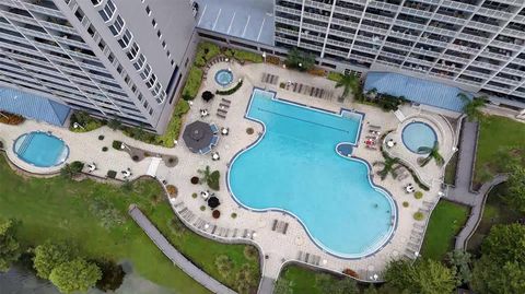 Photo of 13415 Blue Heron Beach Drive #407, Orlando, FL 32821 (MLS # G5101939)