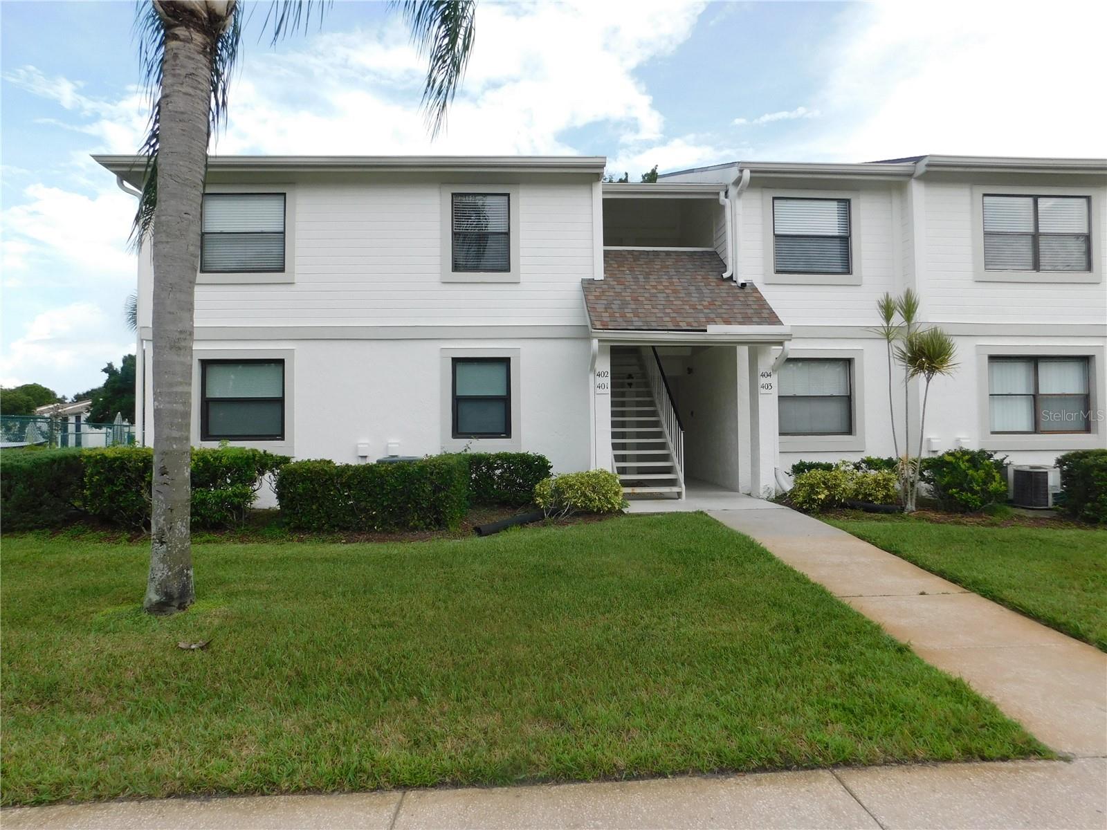 First floor condo in The Meadows of gated East Lake Woodlands is located next to the community pool and has tile flooring thru out the living area. There is a breakfast bar from the living area into the kitchen with a space for a small table and chair in front of the window. Carpet in the bedroom with walk in closet and tub/shower combination in the bath. Sliders from the living area out to the screen enclosed lanai where the washer and dryer are located in the laundry closet. Views of the landscaped yard and the community pool next door. The rent includes water, sewer, trash, basic cable and internet. This is a non-smoking resident and owner is looking for applicants with good credit.