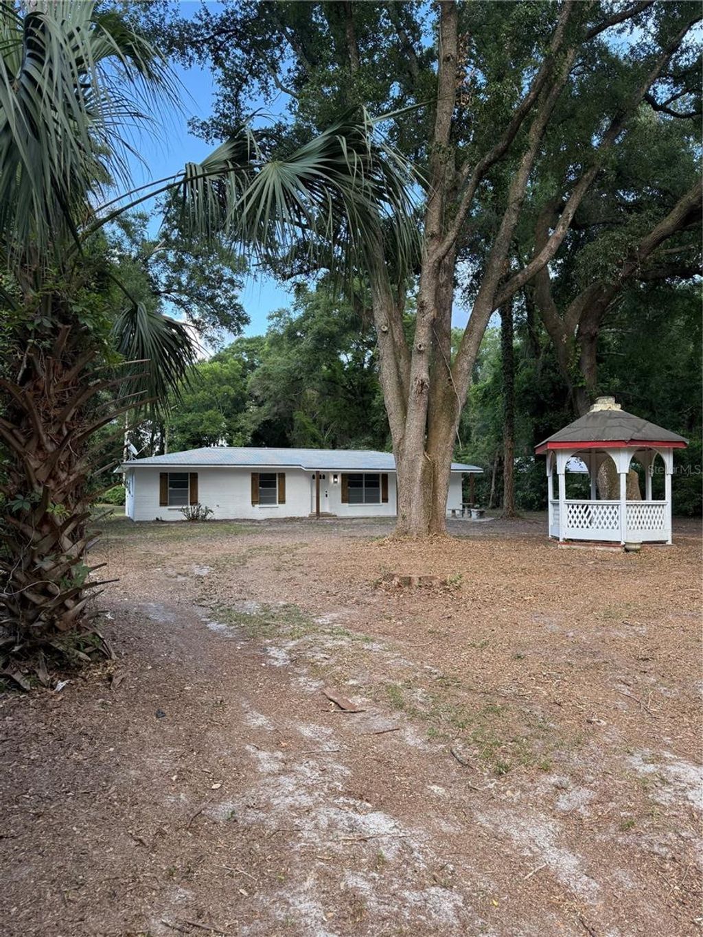 Photo of 6989 SW State Road 26, Trenton, FL 32693 (MLS # R4911441)