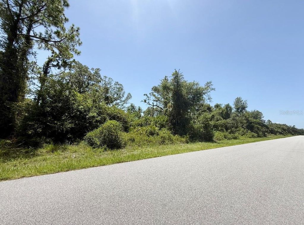 Photo of 940 Bowman Terrace, Port Charlotte, FL 33953 (MLS # C7512840)