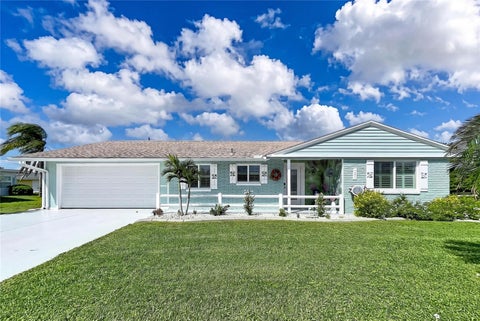 Photo of 621 Oakmont Avenue, Sun City Center, FL 33573 (MLS # TB8560516)
