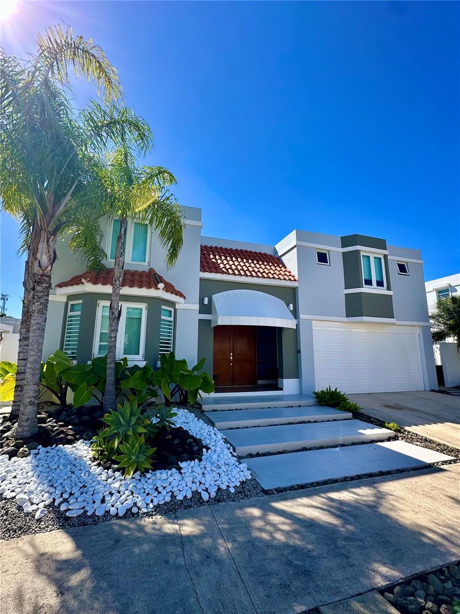 Expanded Home with Pool & Outdoor Living in Paseo Los Corales Located in the sought-after community of Paseo Los Corales, this beautifully expanded property offers an exceptional outdoor experience with a swimming pool, a spacious terrace, and an outdoor bathroom—perfect for relaxation and entertaining. On the first floor, you'll find a versatile flex room, a spacious great room, and a kitchen that seamlessly opens to the family room and pantry. A two-car garage provides convenience and storage. The second floor features a primary en-suite bedroom with an ample walk-in closet, along with three additional bedrooms. Freshly painted and furnished with modern furniture, this home is move-in ready and ideally positioned near top amenities, schools, and shopping in Dorado.