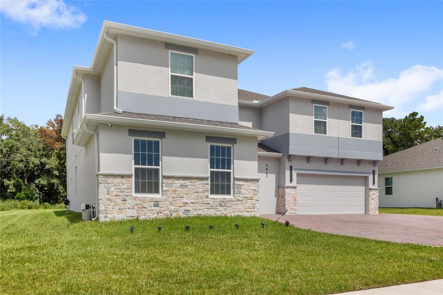 Welcome to 5867 Sierra Crown Street, a one-of-a-kind Palmer Model situated on a premium conservation homesite in the highly sought-after Bargrove Estates community in Mount Dora. Located at the rear of the neighborhood for ultimate privacy, this home boasts 6 spacious bedrooms, 6 bathrooms, and over 4,600 square feet. This home is extensively upgraded inside and out, and nothing like the builder offers it! The home features a true open-concept great room and gourmet kitchen configuration, featuring extended custom cabinetry and upgraded luxury appliances. Every detail has been elevated, from new flooring throughout (no carpet throughout), including luxury vinyl plank on both staircases and through all of the upstairs. The home also features upgraded lighting fixtures and recessed lighting throughout.
A standout feature of this property is the multi-generational in-law casita, complete with its own private entrance, kitchenette, large walk-in closet, and a fully upgraded en-suite bathroom featuring a frameless glass shower.
Upstairs, you’ll find an oversized gathering room with custom built-ins and extended quartz countertops, creating the ideal space for entertaining, relaxing, or game nights. The primary suite is oversized and offers exceptional space, with an additional sitting area, which can also function as a home office. The primary en-suite features split vanities, a large soaking tub, an enclosed shower and 2 large walk-in closets. Four additional guest bedrooms and 2 additional bathrooms and a thoughtfully designed laundry room with built-in cabinetry complete the upper level.
The home also features a two-car garage with finished flooring, and already under HVAC, making it perfect for a gym, office, or hobby space. A whole-home water softener and filtration system come with the home. The driveway has been extended, and the outdoor lighting upgraded to enhance curb appeal. Every bathroom in the home has been upgraded with tile extended to the ceiling, adding a custom finish throughout. A craft room/flex space on the main floor adds even more functionality. The backyard is primed and ready for a future pool installation.
Bargrove Estates offers a community playground and greenspace, and is located just off Highway 441, minutes from historic downtown Mount Dora and all of its charming shops, dining, and events. With easy access to SR 429, commuting to downtown Orlando, Orlando International Airport, and Walt Disney World is a breeze. 5867 Sierra Crown Street combines custom, luxury finishes with multi-generational functionality. Don’t miss the opportunity to own one of the most unique and upgraded homes in Bargrove Estates. Call today to schedule a private tour.