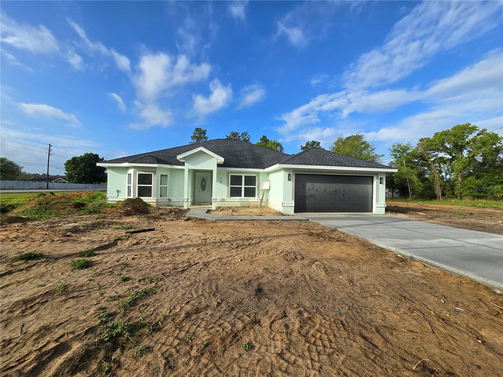 Photo of 18 Hemlock Radial Trail, Ocala, FL 34472 (MLS # OM722506)