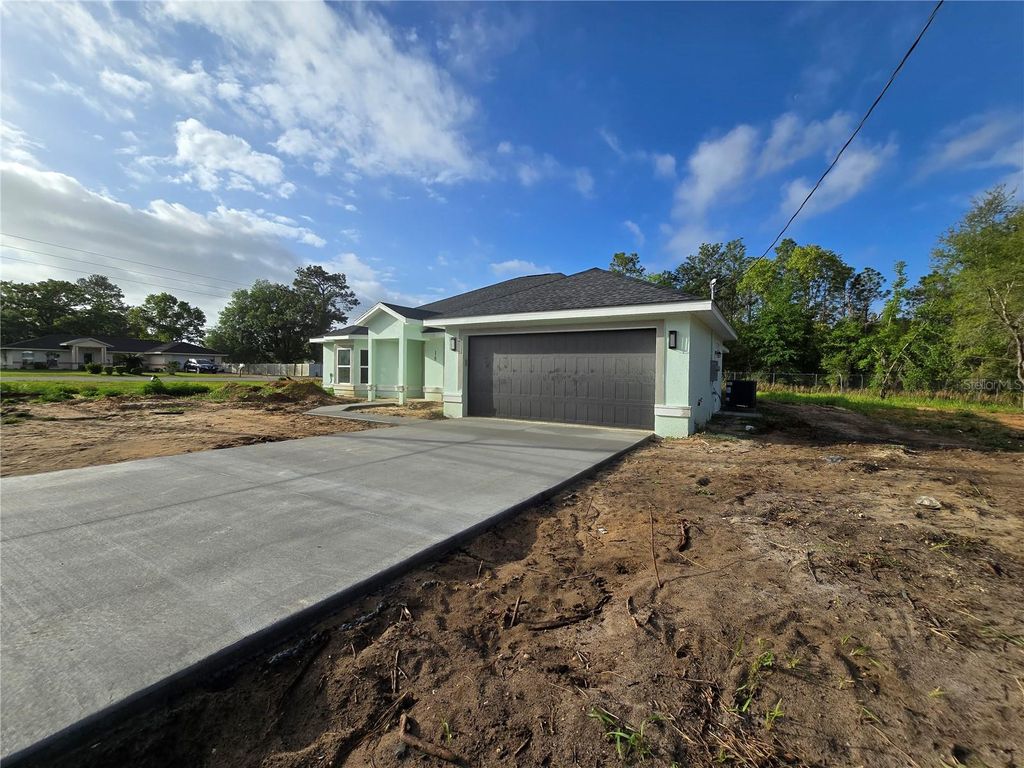 Photo of 18 Hemlock Radial Trail, Ocala, FL 34472 (MLS # OM722506)