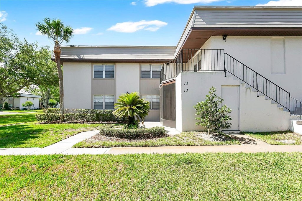 Photo of 11 Windtree Lane #B, Winter Garden, FL 34787 (MLS # O6409169)