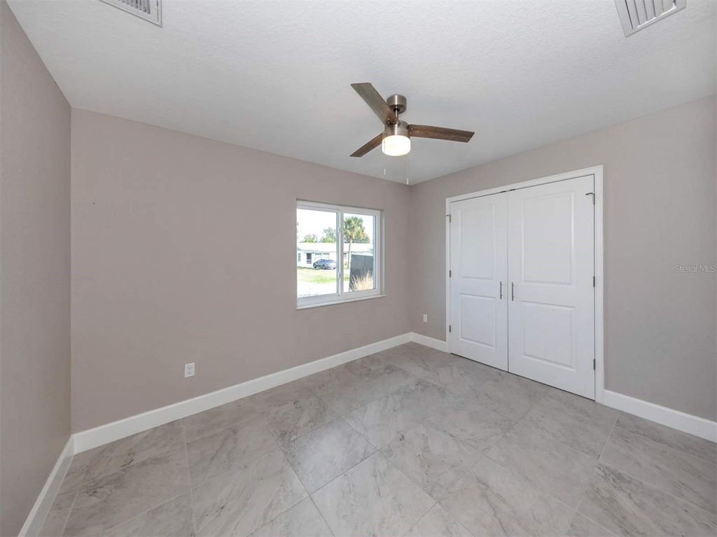 Photo of 125 Boundary Boulevard #2, Rotonda West, FL 33947 (MLS # A4689500)