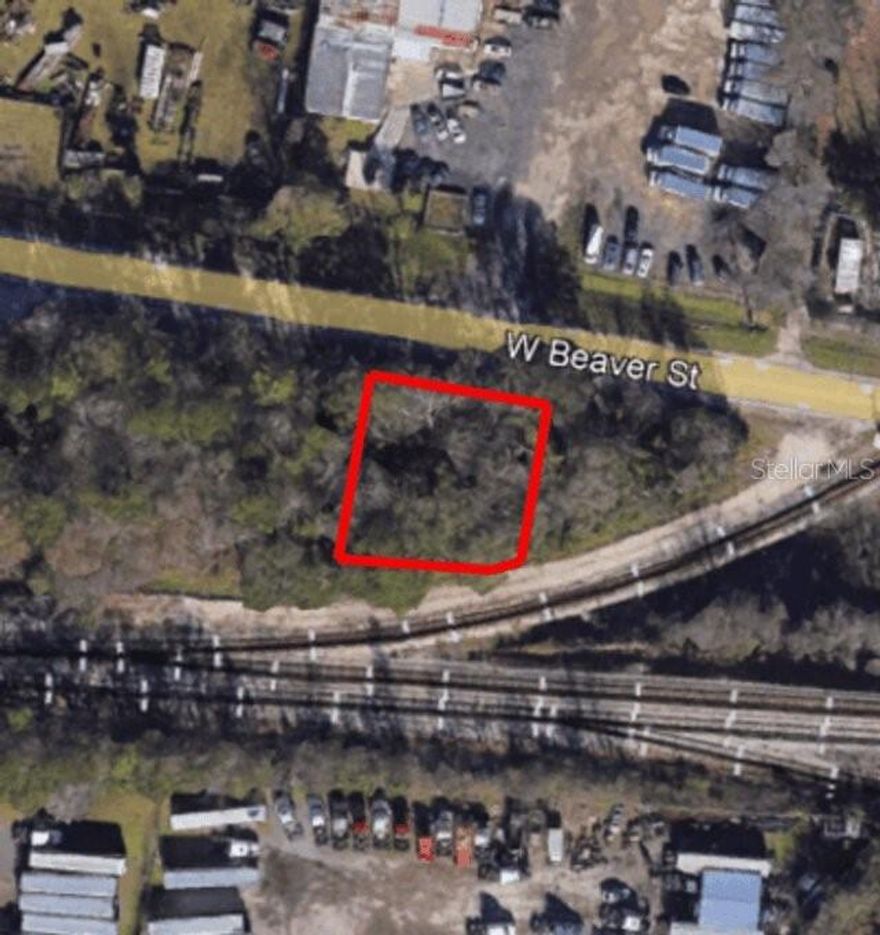 This 0.23-acre industrial land parcel on West Beaver Street in Jacksonville’s well-established Westside industrial corridor offers immediate access to I-295 and I-10, ideal for light industrial, contractor storage, parking, or logistics support. Situated among warehouses, truck yards, and service uses, the site benefits from high visibility along a primary east-west freight route and excellent regional connectivity for distribution and service operations. Its compact size and strategic location make it a flexible, hard-to-find industrial holding or development opportunity.