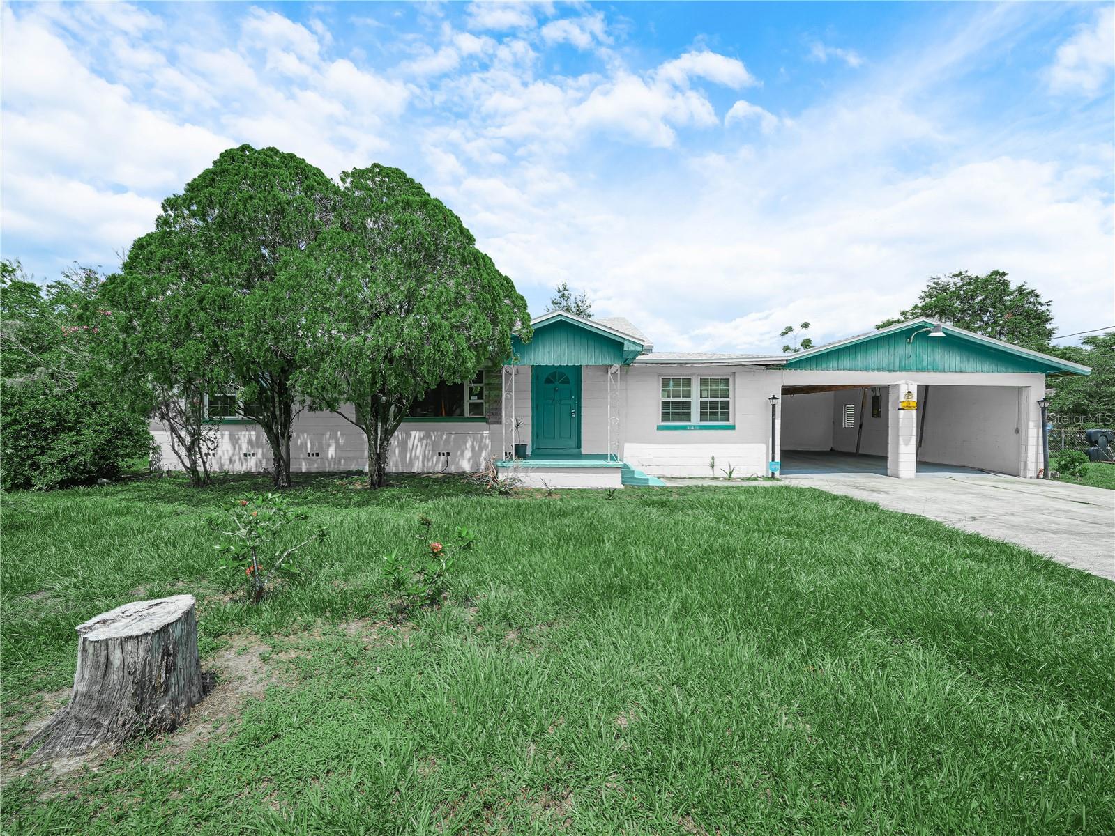 INVESTOR SPECIAL - This sprawling 5 bedroom house is in need of a renovation, but would be perfect for a large family. The roof is only two years old and the HVAC was replaced in 2018. Kitchen has real wood cabinets, plenty of counter space and comes with all the appliances. The house has TWO adjacent dining rooms, so you can easily accommodate your extended family for holiday meals and special occasions! Next to the dining rooms you'll find a flex space that could be used as a computer room, study hall, you name it. There's a large living room plus a family room, and even a BONUS room. The spacious inside laundry room comes with a washer and dryer. Outside you'll find an adjacent two-car garage, and a two-car carport with workshop for all your projects. The yard is a third of acre in size and is fully chain-link fenced. With a new construction home going up across the street, and a few on the next block, the neighborhood is being redeveloped, so this home is in a prime location. The title search has already been completed, which will fast-track closing on this purchase, so call now!