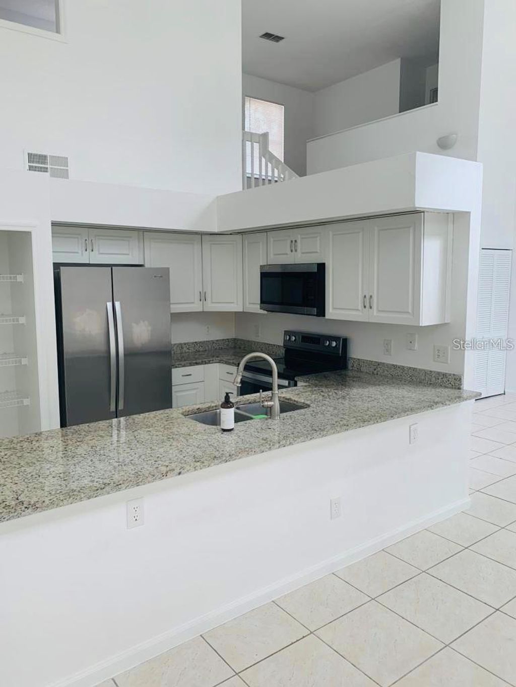 Photo of 594 Oak Branch Circle, Kissimmee, FL 34758 (MLS # S5132670)