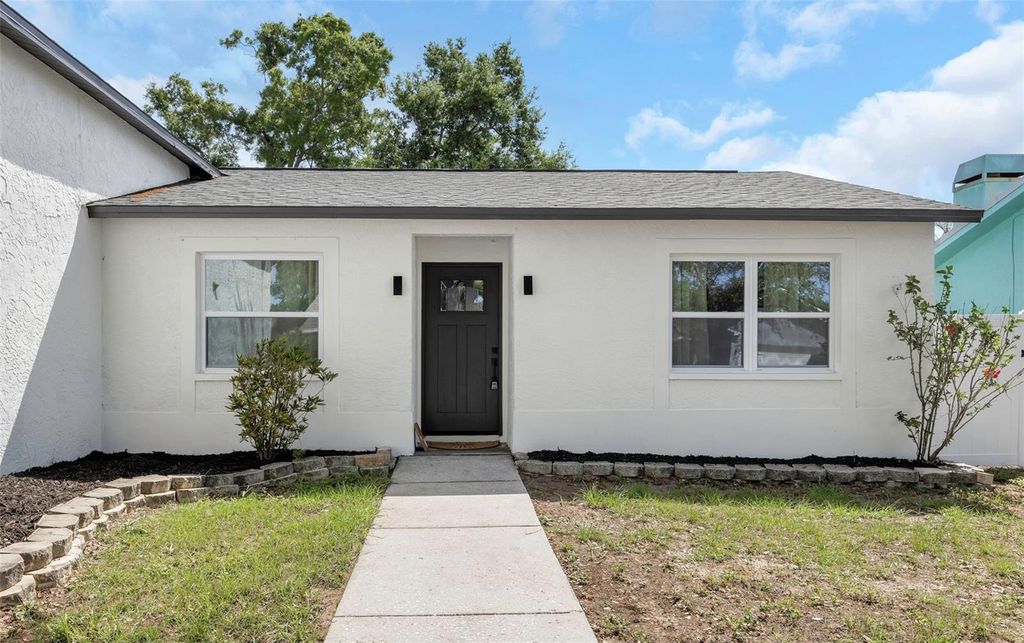 Photo of 12909 Pineway Drive, Largo, FL 33773 (MLS # TB8497695)