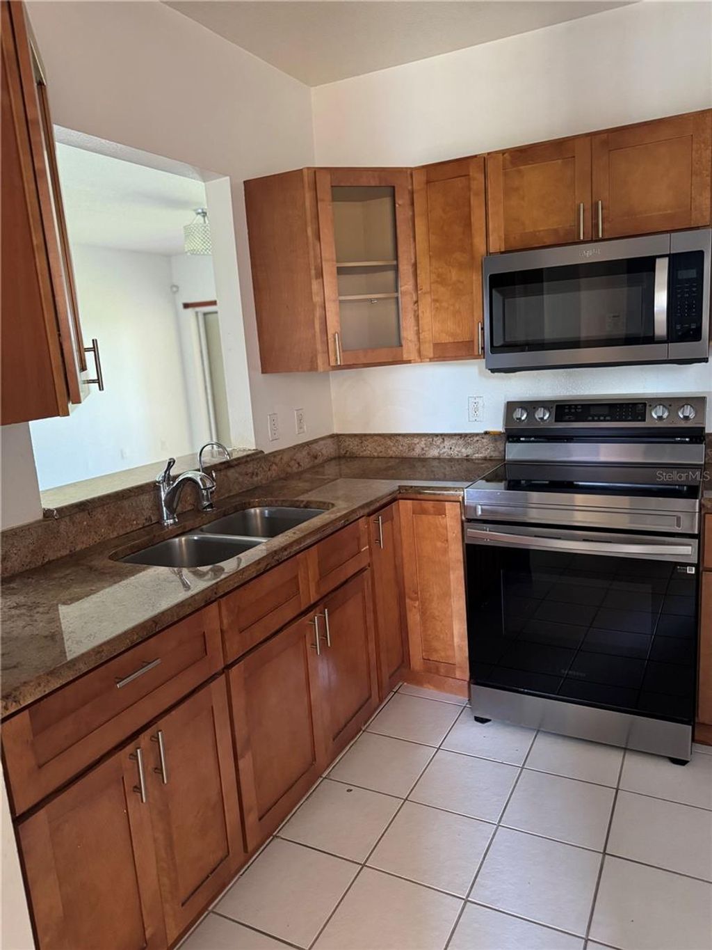 Photo of 495 Las Cortes Lane #203, Orlando, FL 32824 (MLS # S5150447)